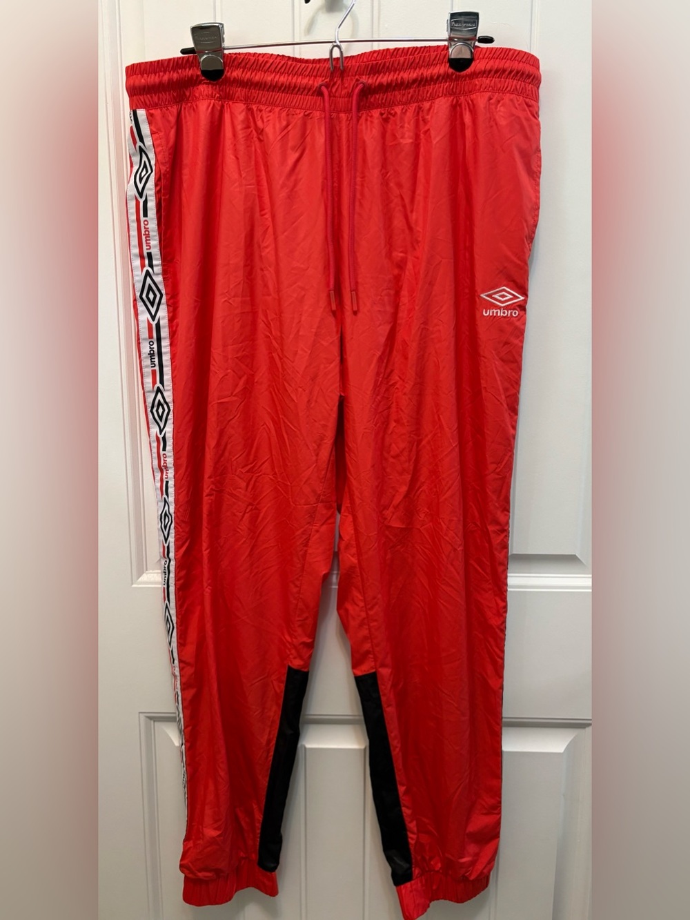 Umbro Red Athletic Track Pants with Patterned Side Tape. Woman’s Size XL.